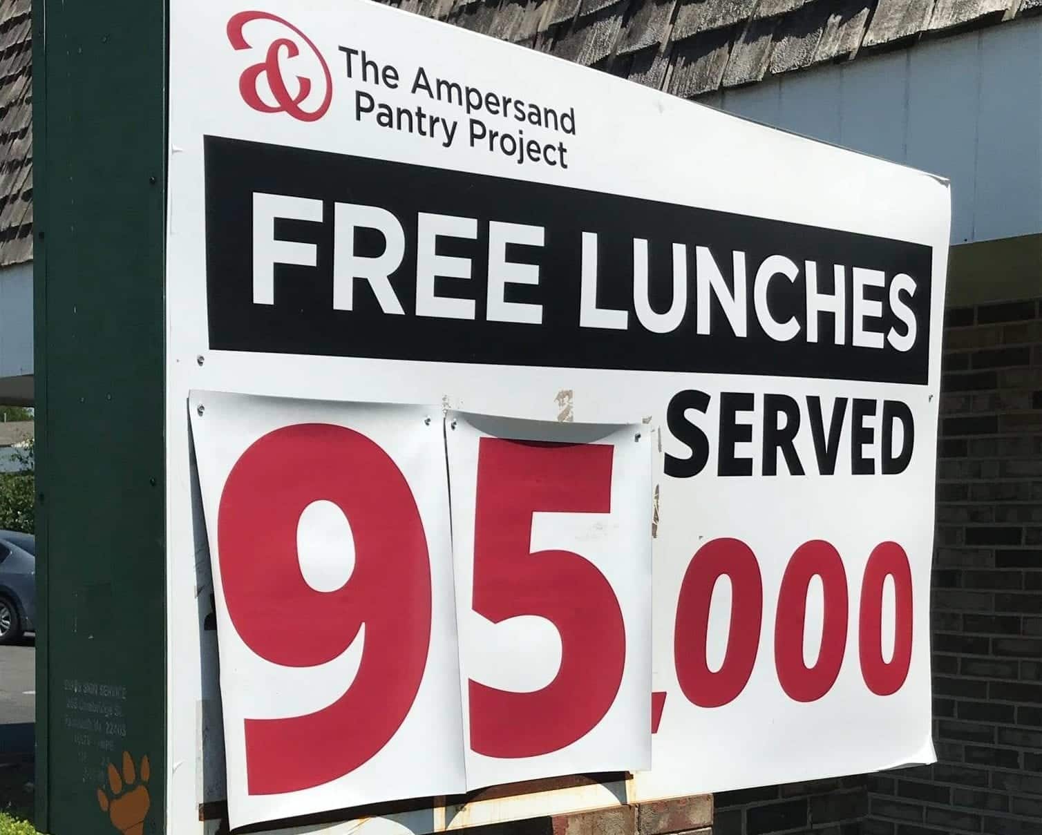 sign celebrating 95k free lunches served