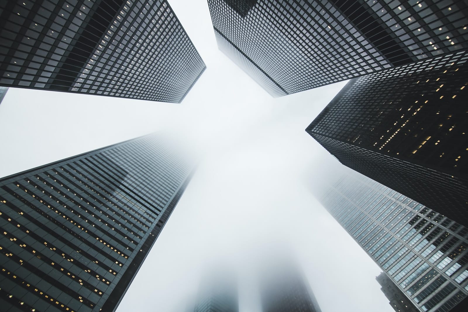 looking up at skyscrapers